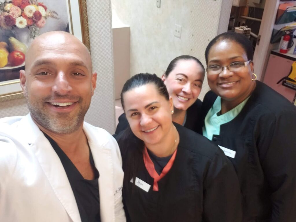 Dr. Zaidi w. his assistants